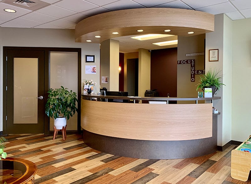 The welcoming front desk and lobby at Focus Dental Studio in Springfield, MO